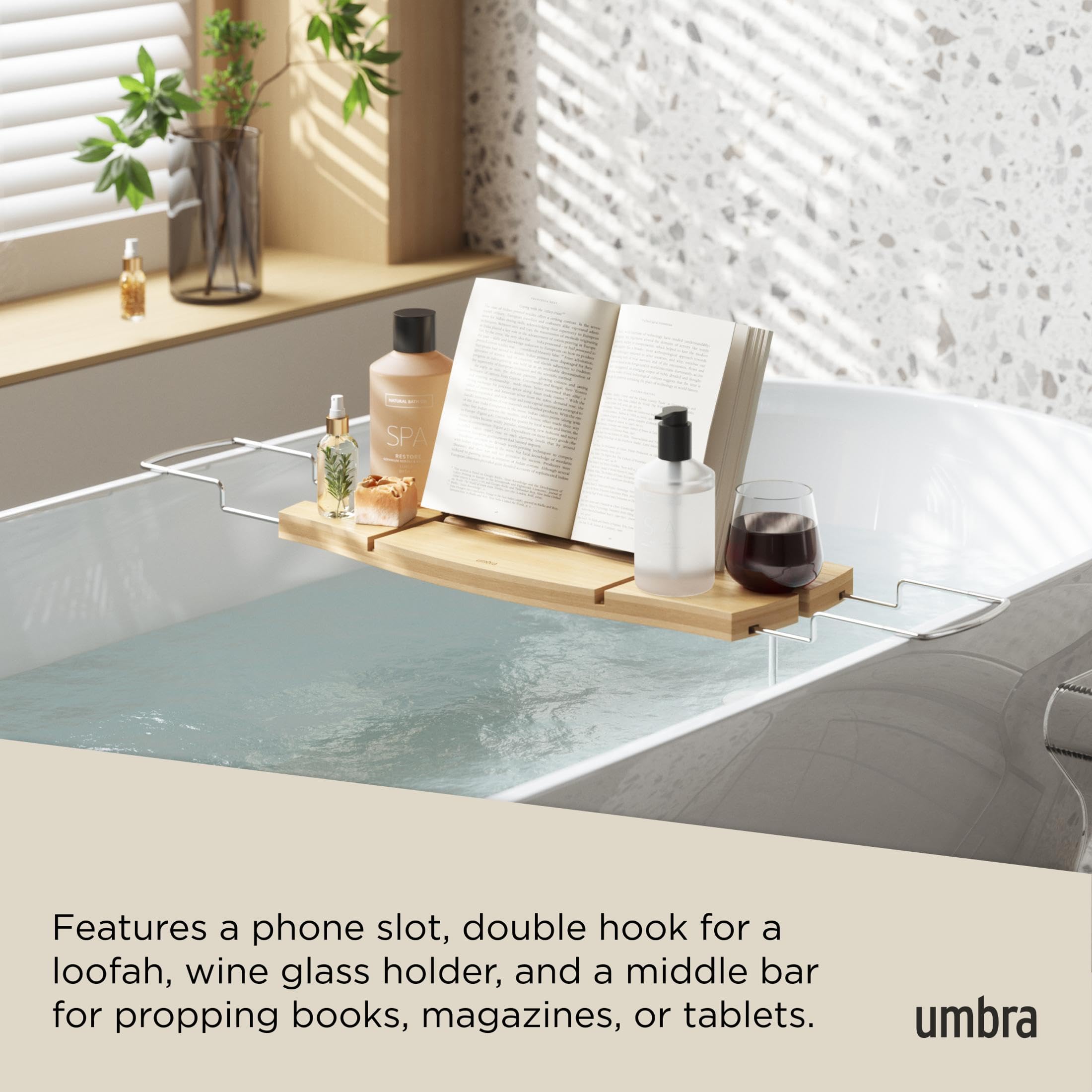 Umbra Aquala porte-verre tenant une coupe pour moments détente
