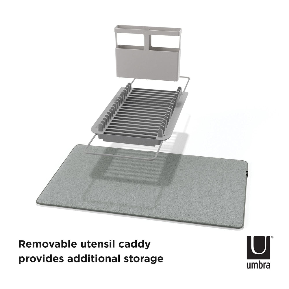 Umbra Udry replié pour rangement montrant gain de place et discrétion