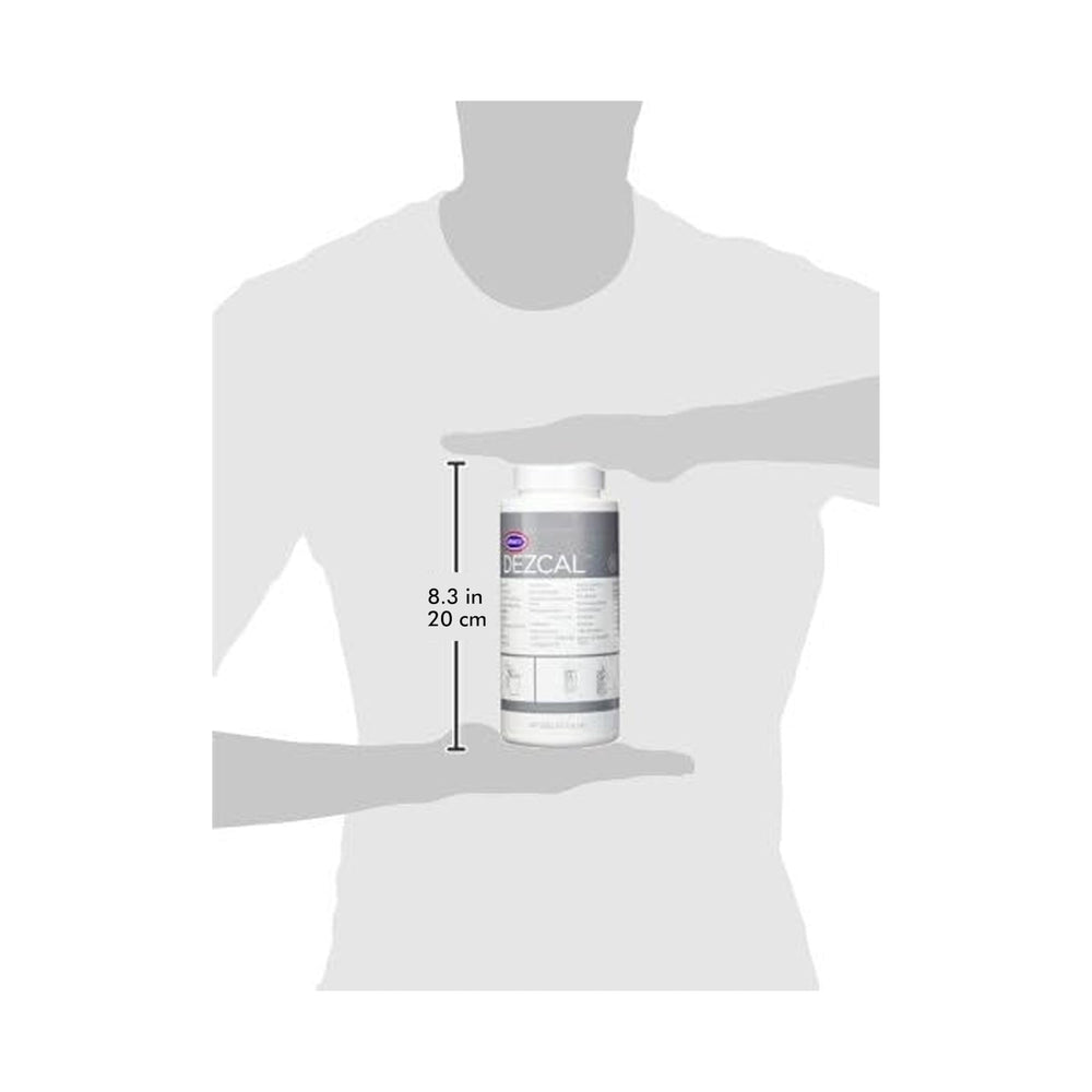 Urnex Dezcal en cours d'application dans une machine espresso, nettoyage efficace