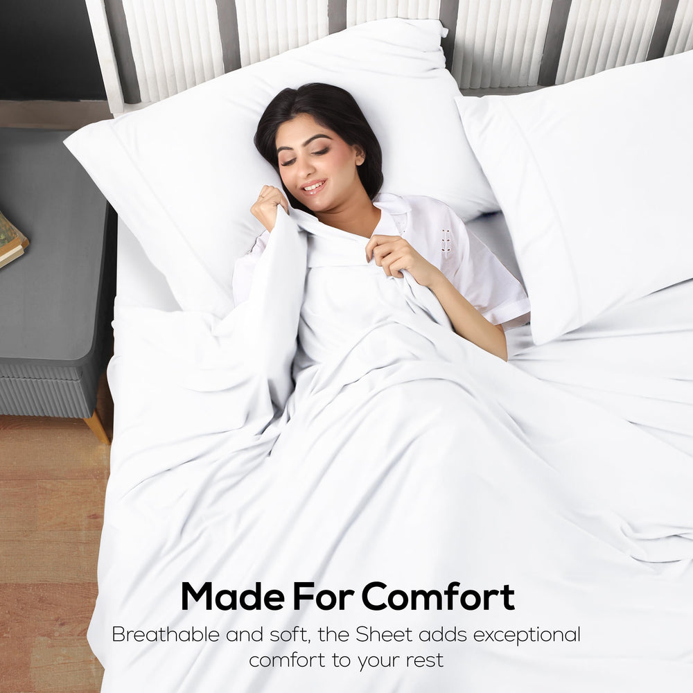 Utopia Bedding décor de chambre avec draps installés suggérant ambiance chaleureuse