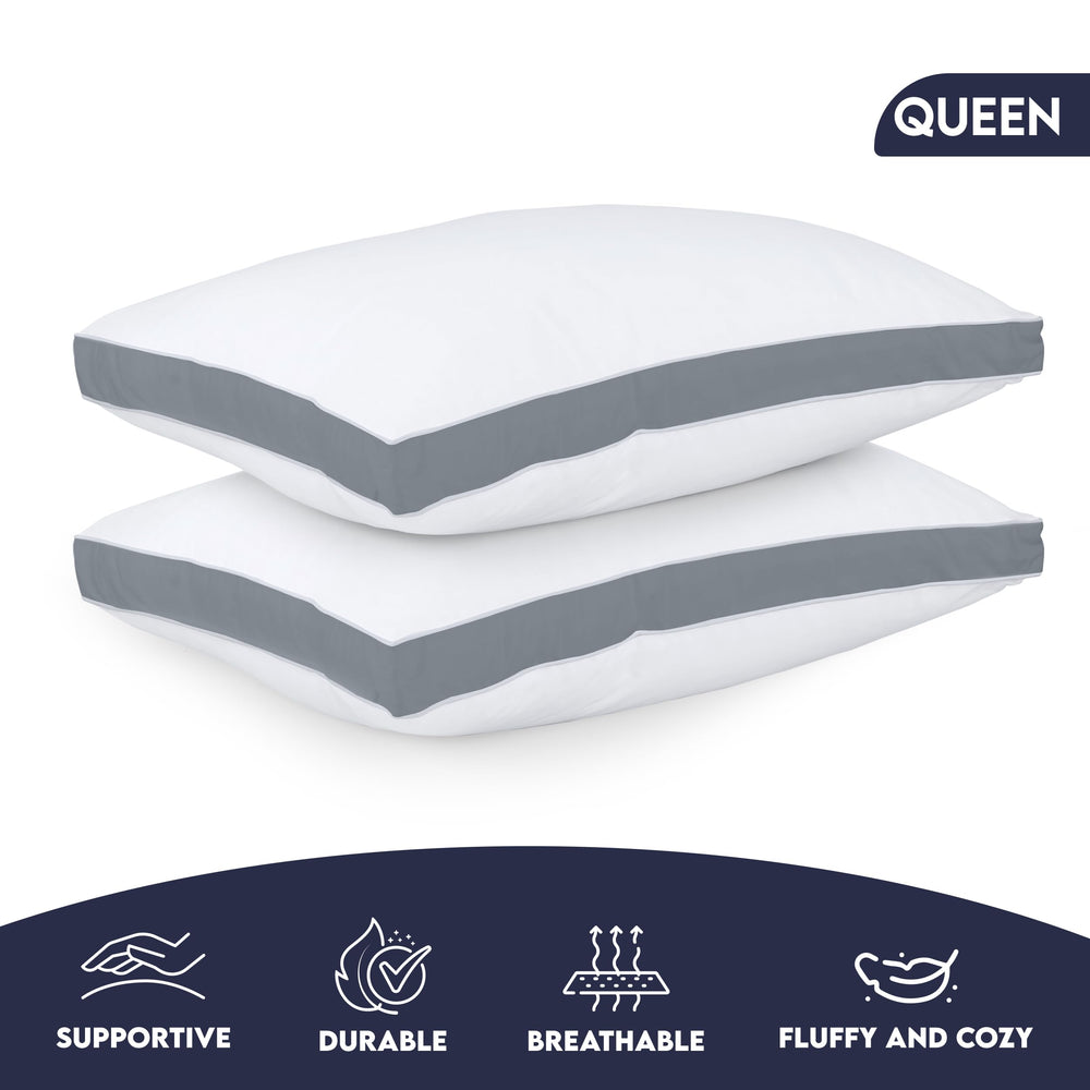 Utopia Bedding deux oreillers posés sur lit style hôtelier