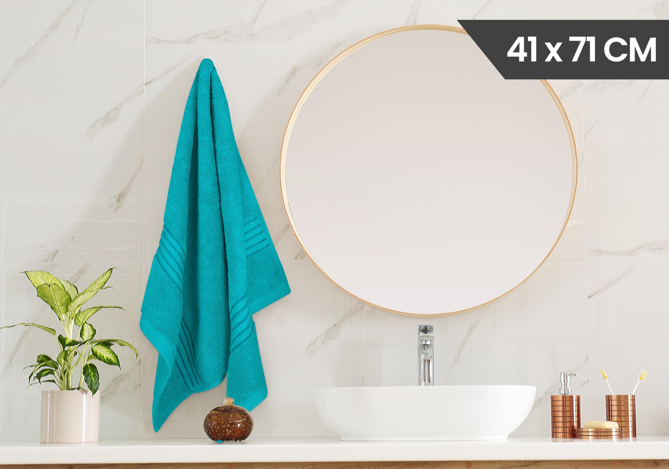 Utopia Towels mise en scène salle de bain apportant touche déco turquoise