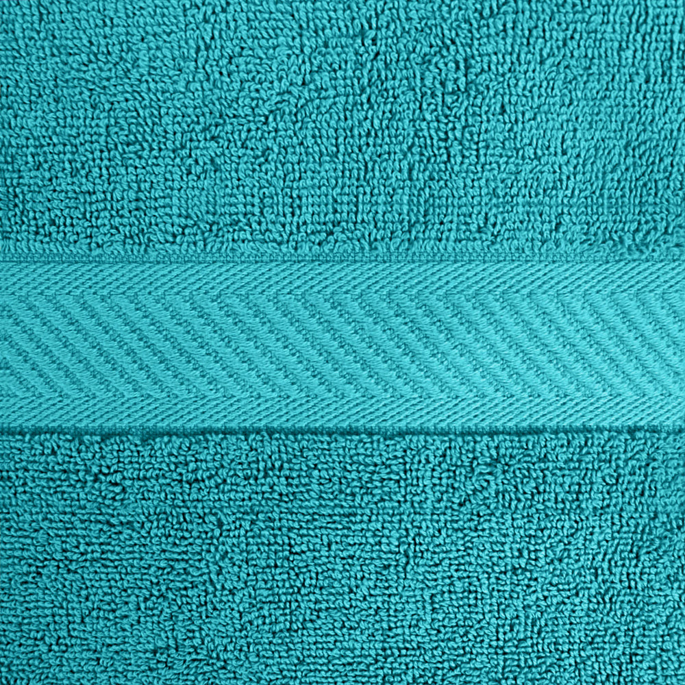Utopia Towels gros plan sur bords doublement cousus montrant durabilité au lavage