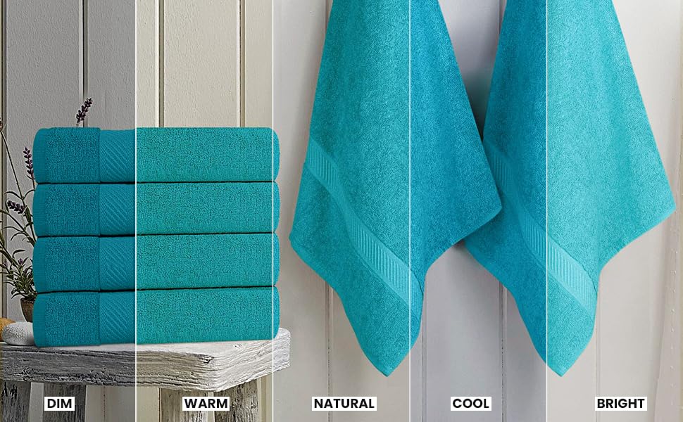 Utopia Towels comparaison taille avec main montrant dimensions 24x48 pouces utiles
