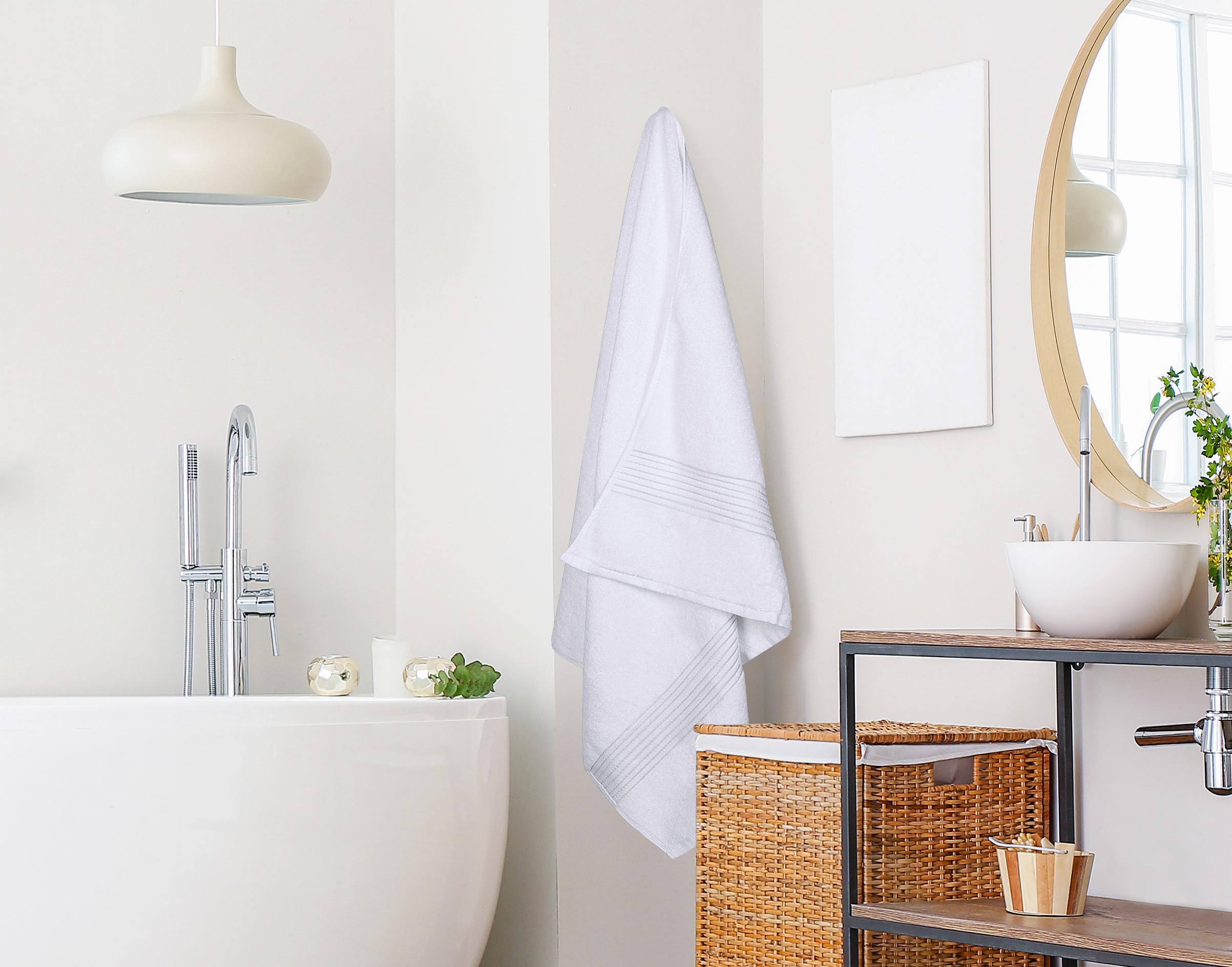 Utopia Towels comparaison taille montrant couverture supérieure pour adultes