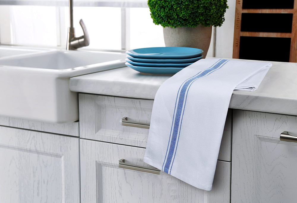 Utopia Towels comparaison taille 15x25 in à côté d’un carnet pour échelle
