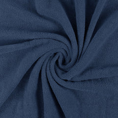 Utopia Towels serviette pliée prête à ranger montrant gain de place et commodité