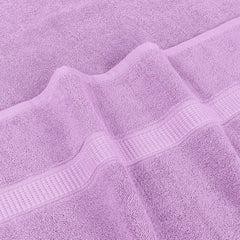 Utopia Towels serviette enroulée montrant l'échelle et le format généreux