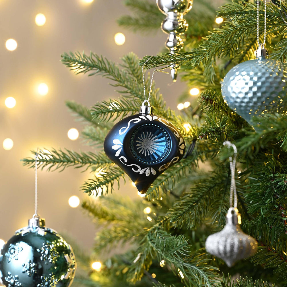 Valery Madelyn mise en scène sapin bleu marine argent pour inspiration
