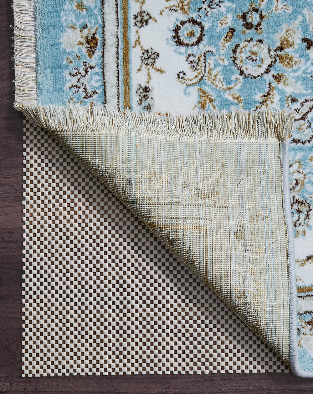 Veken packaging avant montrant le sous-tapis 7x9 et ses bénéfices antidérapants