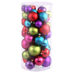 Vickerman boules multicolores sur sapin montrant harmonie et éclat festif