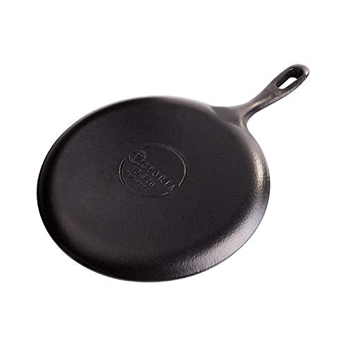 Victoria poêle en usage sur cuisinière gardant chaleur homogène