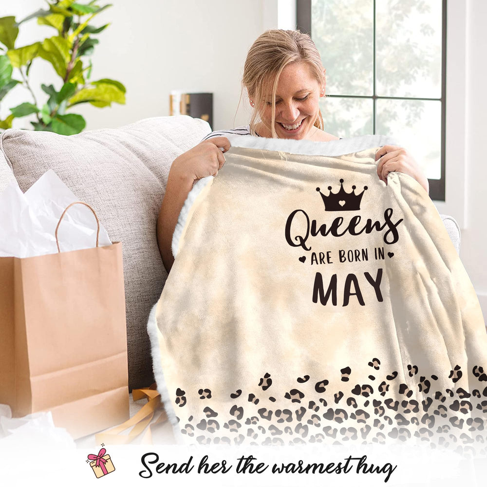 Vprintes May Queens porté sur canapé offrant chaleur et détente
