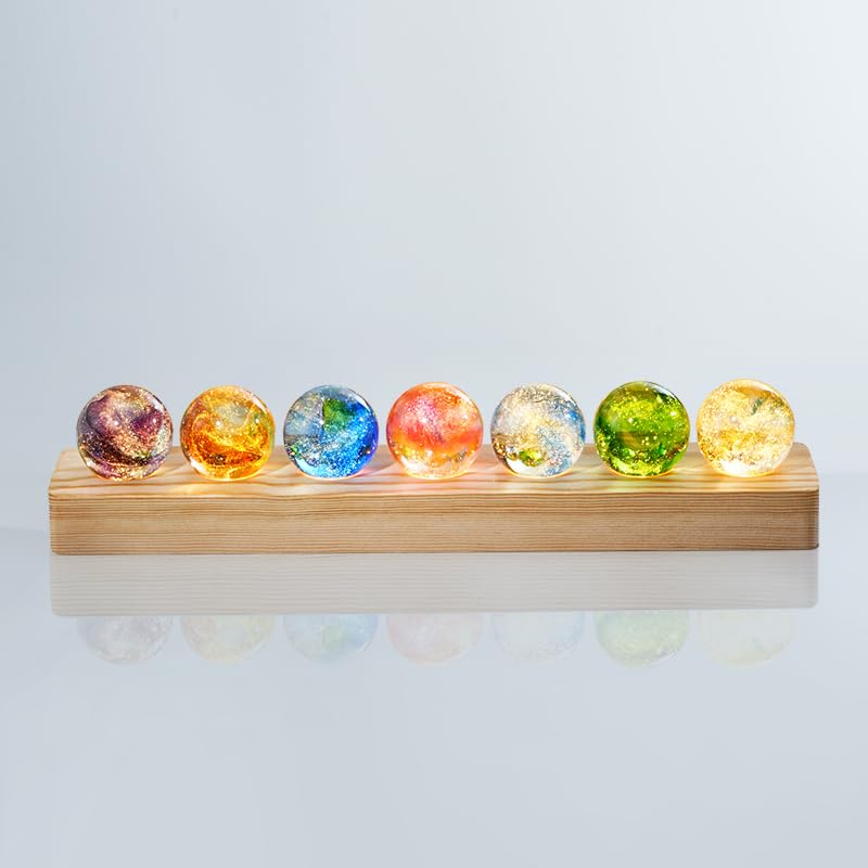 vskikris comparaison de taille montrant sphères 40 mm et socle en bois, repère d'échelle pratique