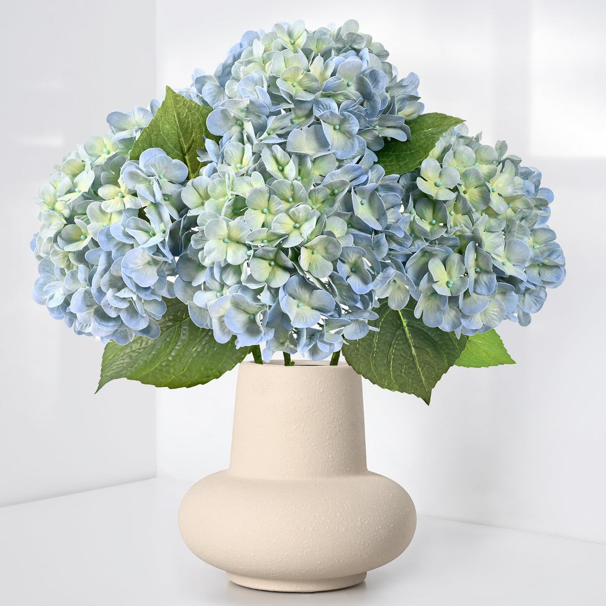 Waipfaru hortensias pack avant montrant quatre tiges prêtes à décorer