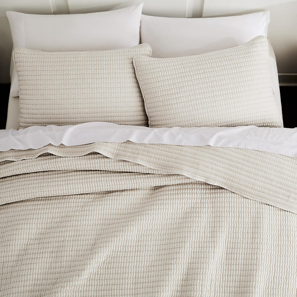 WDCOZY couette beige face entière montrant finition et confort