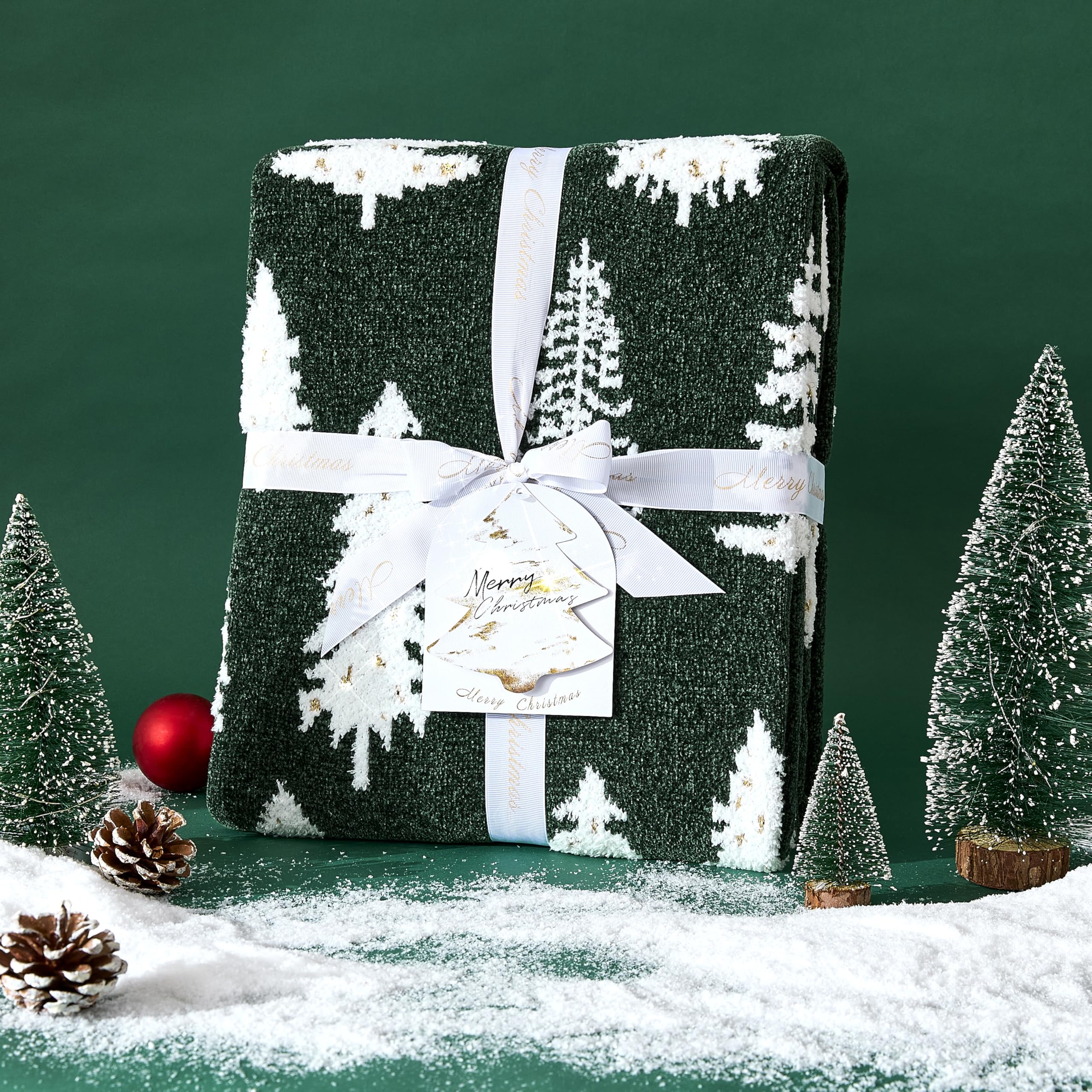 Détail motifs arbres de Noël WDCOZY verts et dorés pour ambiance festive instantanée