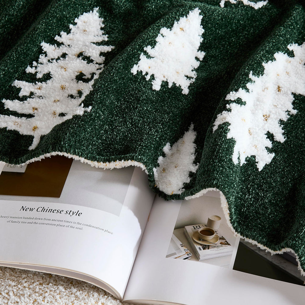 Plaid WDCOZY plié et présenté en coffret cadeau inspirant pour fêtes et hôtes