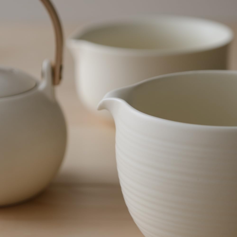 WENSHUO gros plan émail crème révélant finition mate et tactile