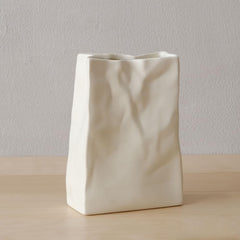 WENSHUO vase face avant montrant silhouette sac papier, apporte élégance minimaliste