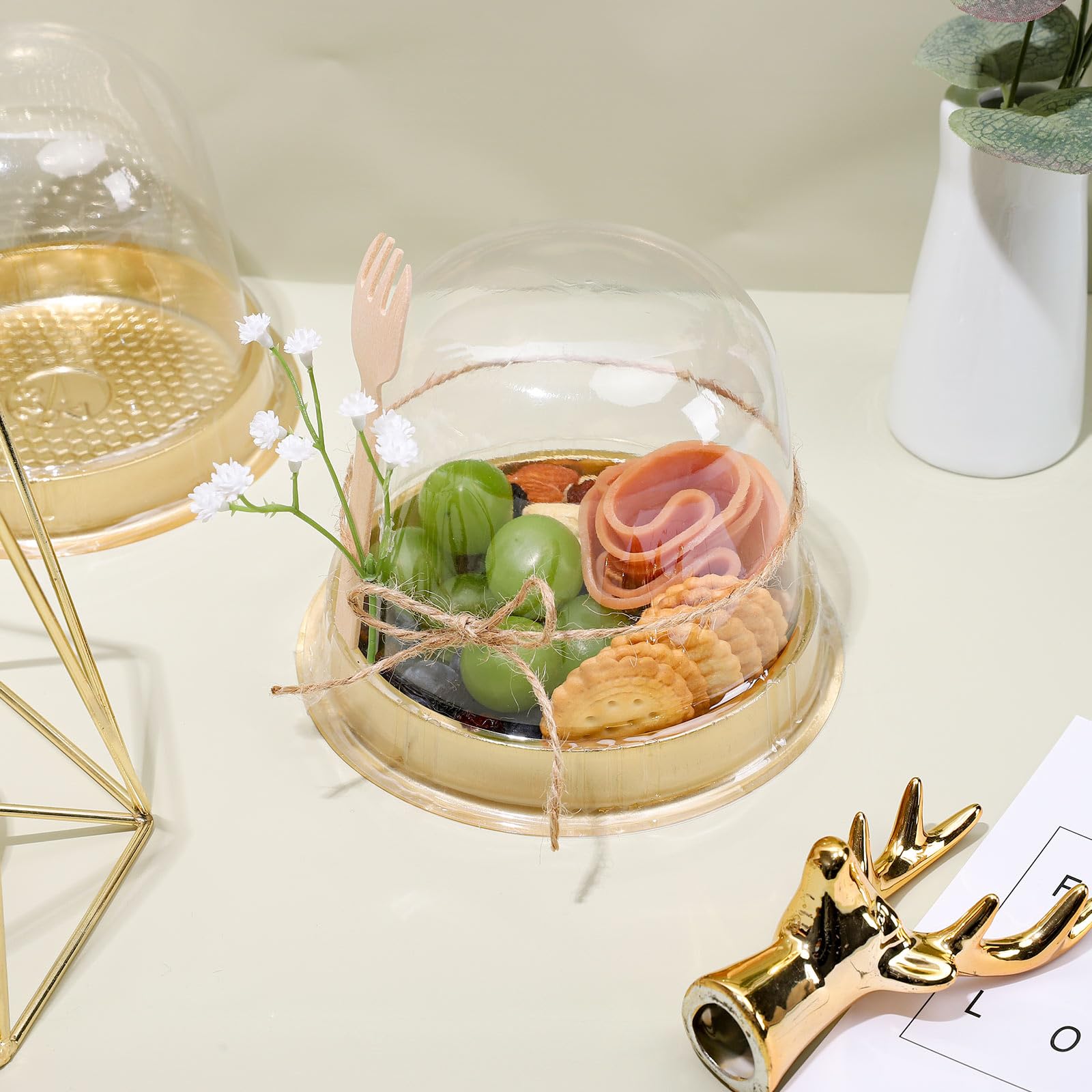 Whaline cupcake sur socle or illustrant présentation professionnelle