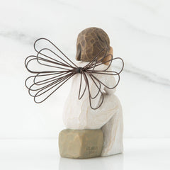 Willow Tree en situation sur manteau apportant chaleur décorative