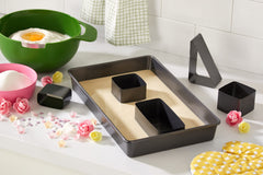 Wilton inserts modulables en acier montrant les formes lettres et chiffres réutilisables