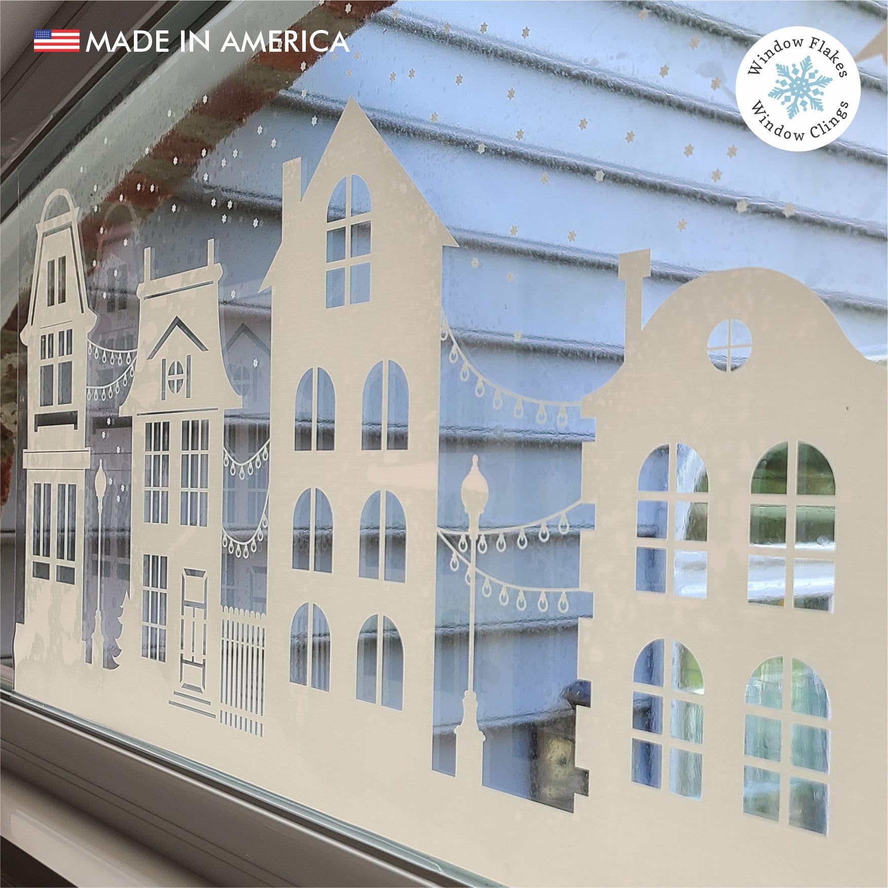 Window Flakes posé à la main avec vaporisateur prouvant application sans résidu