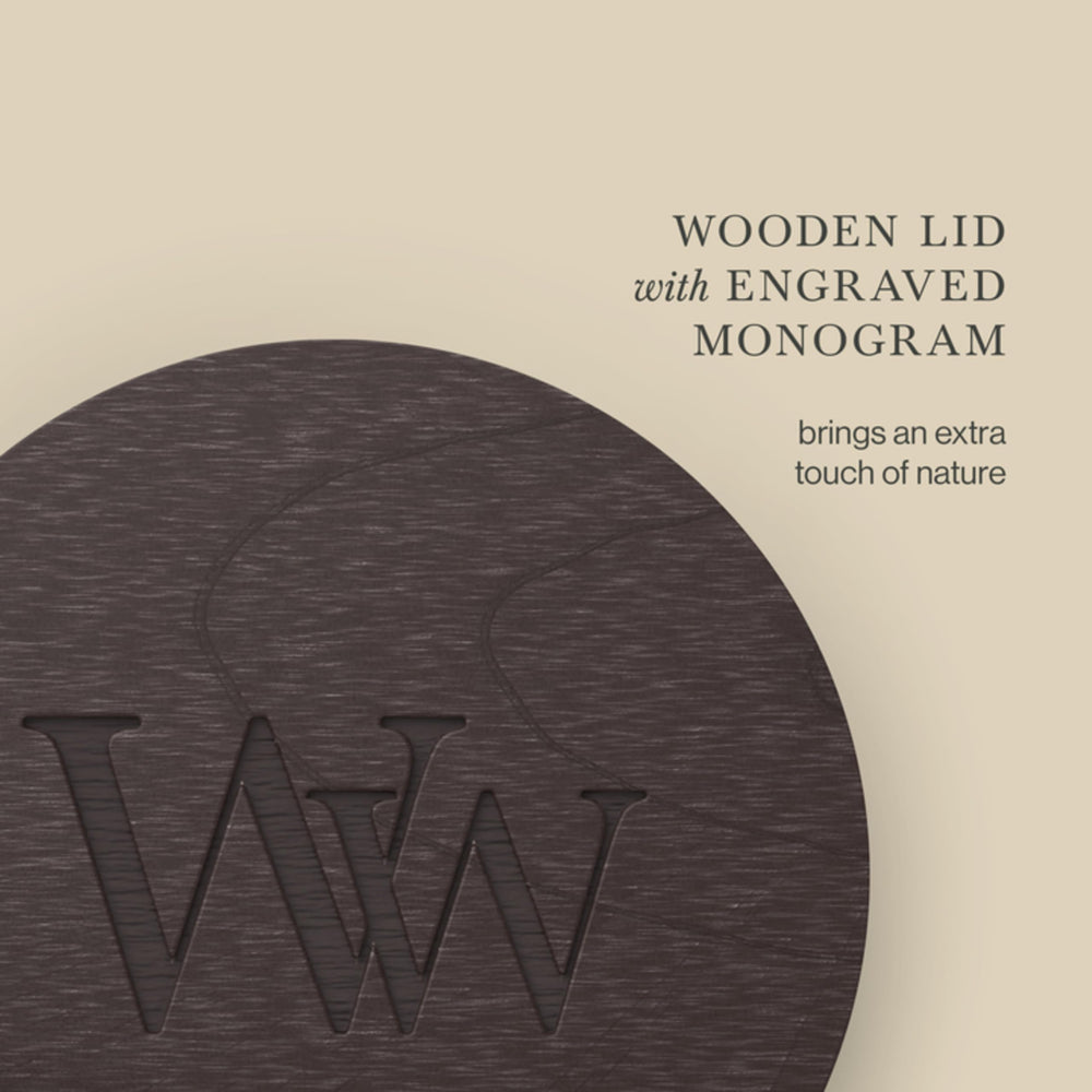WoodWick comparaison taille avec main montrant robustesse et grande contenance