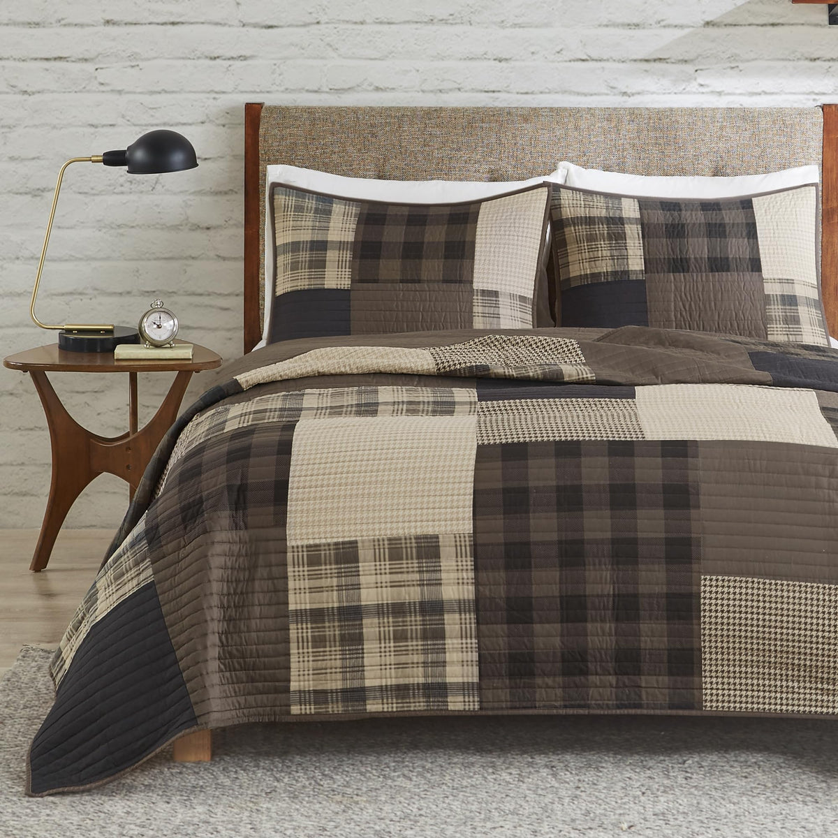 Woolrich couette face avant montrant motif Aztec et transformation instantanée