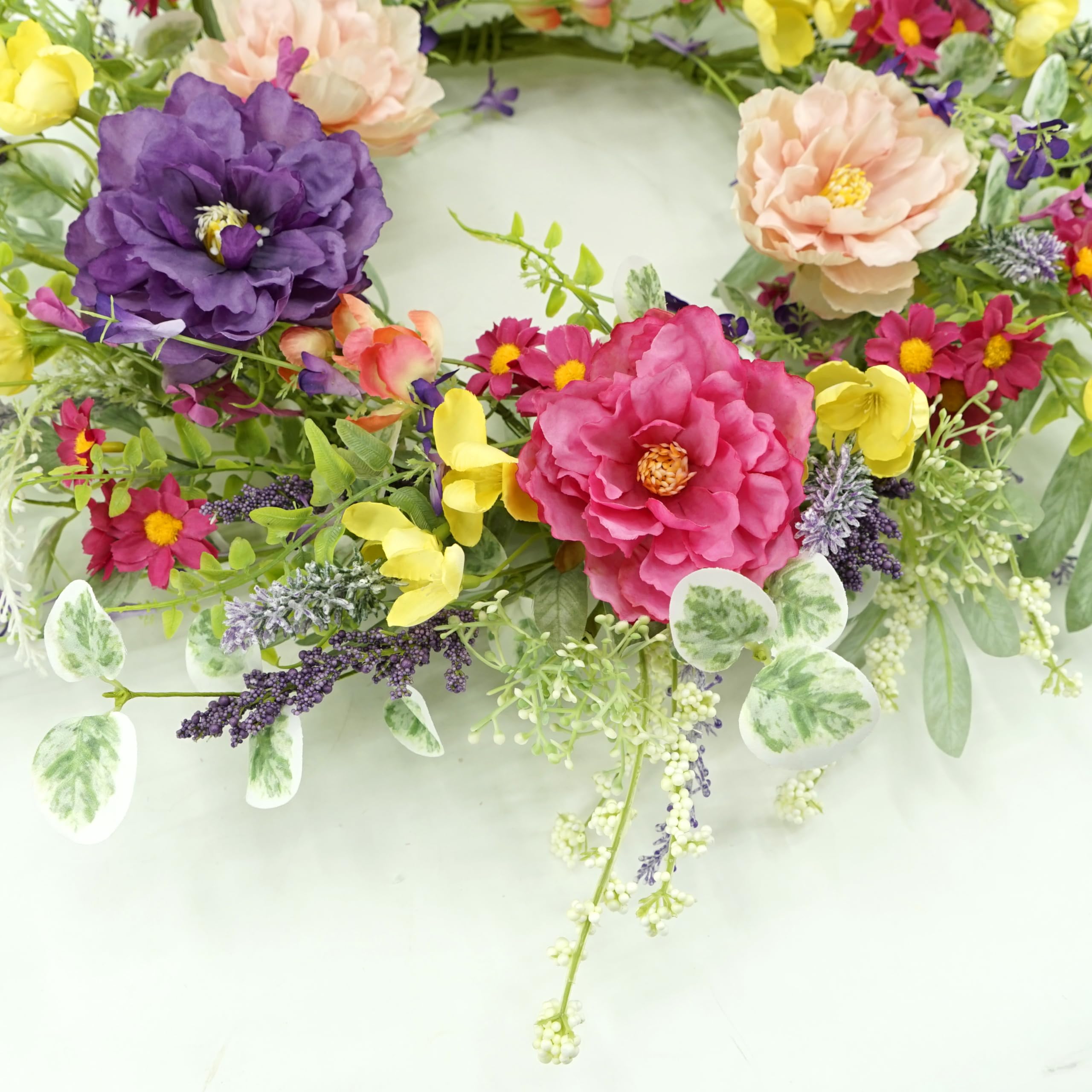WreathDream comparaison taille avec main montrant échelle et proportion