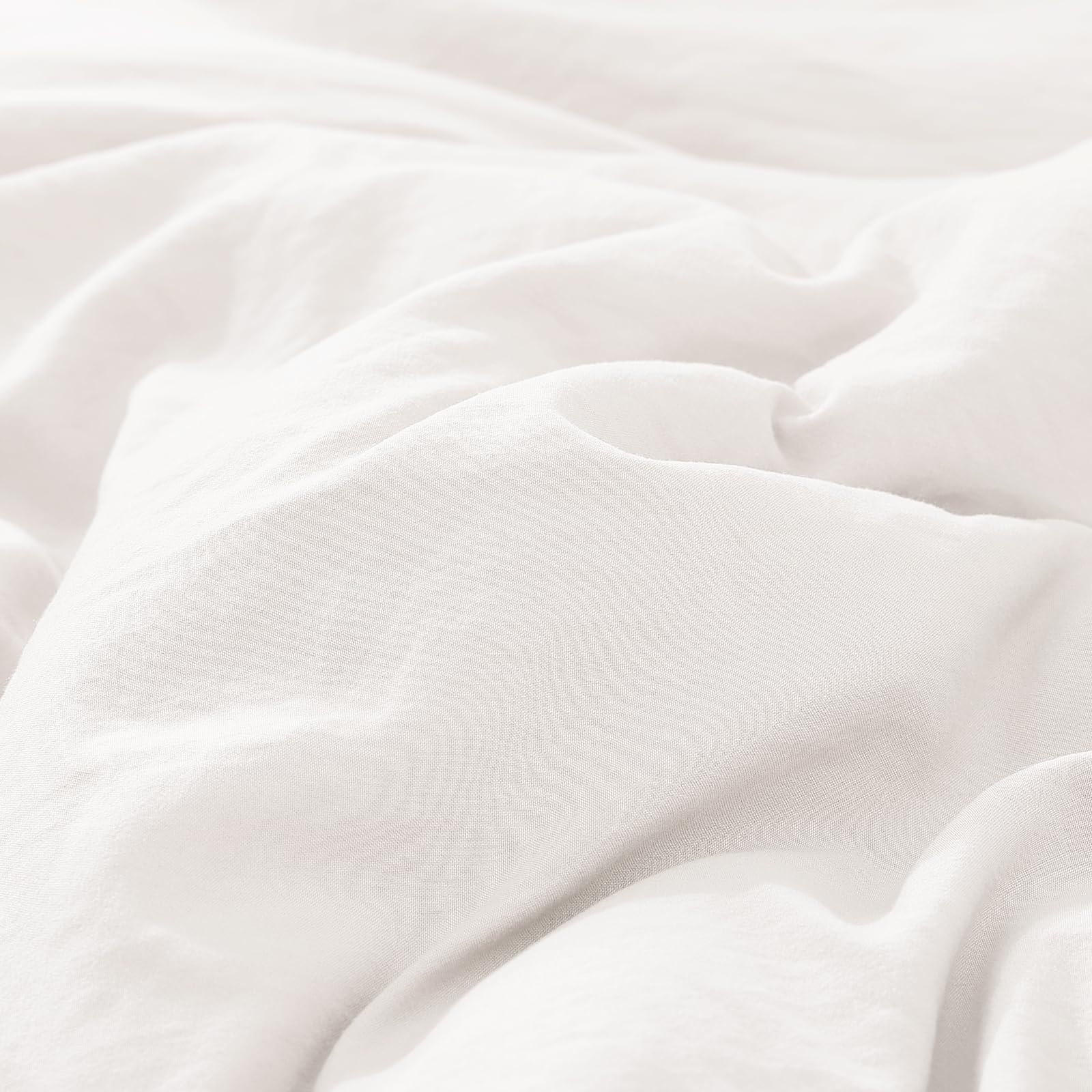 WRENSONGE comparaison de taille sur un lit montrant l ajustement Twin XL