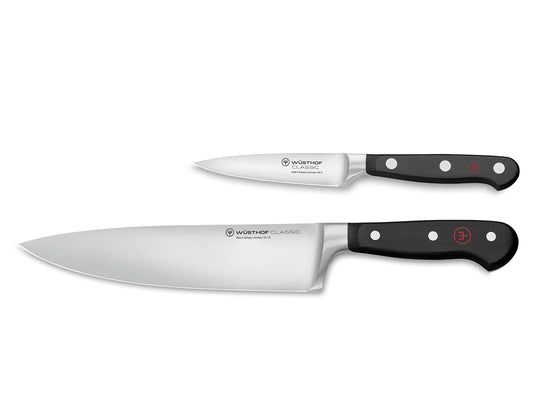 Wüsthof couteau chef face avant montrant la lame et la finition, coupe précise