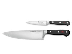 Wüsthof couteau chef face avant montrant la lame et la finition, coupe précise