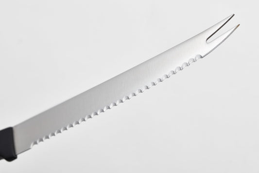 Wüsthof lame dentelée détail illustrant la précision et résistance de coupe