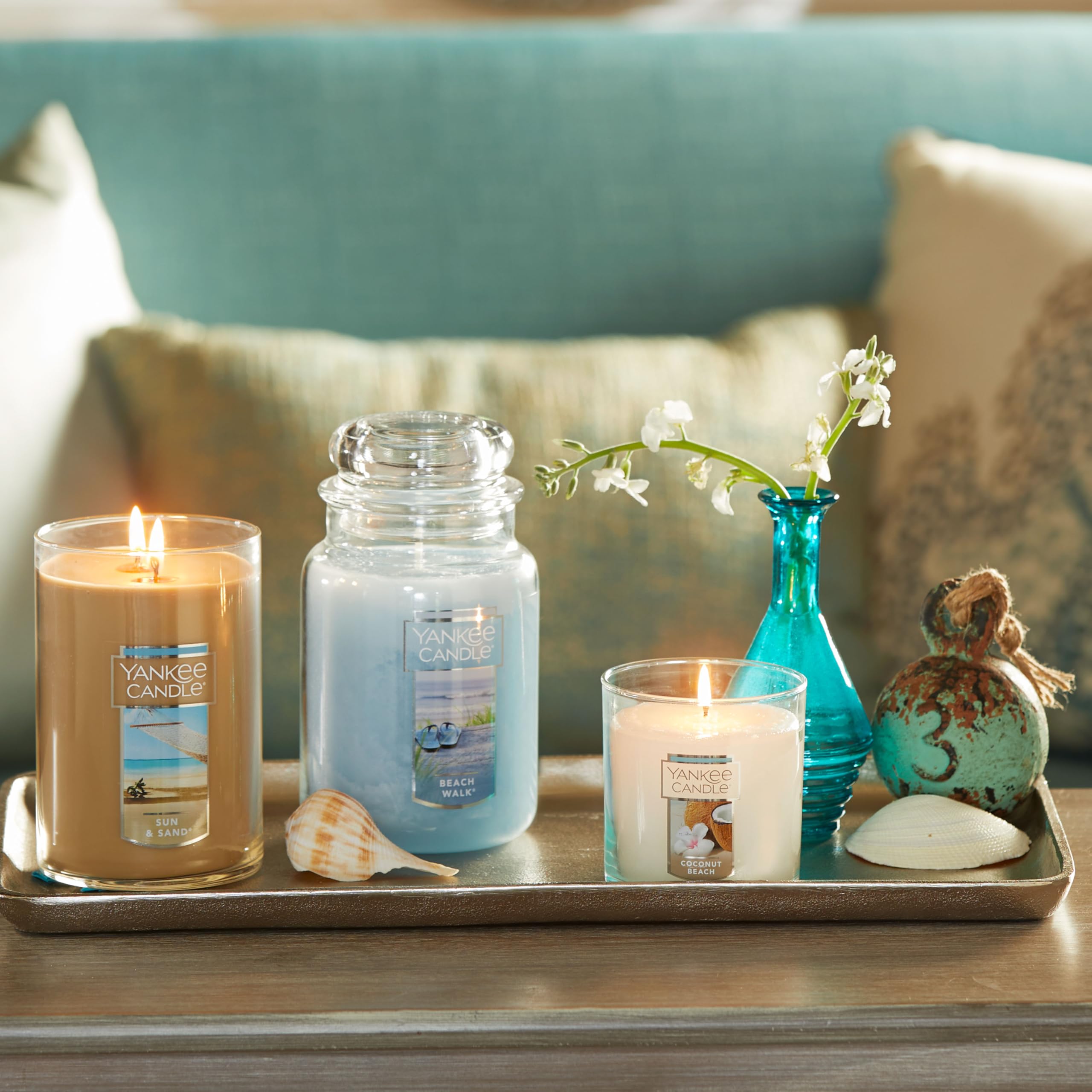 Yankee Candle bougie allumée diffusant parfum marin chaleureux et apaisant