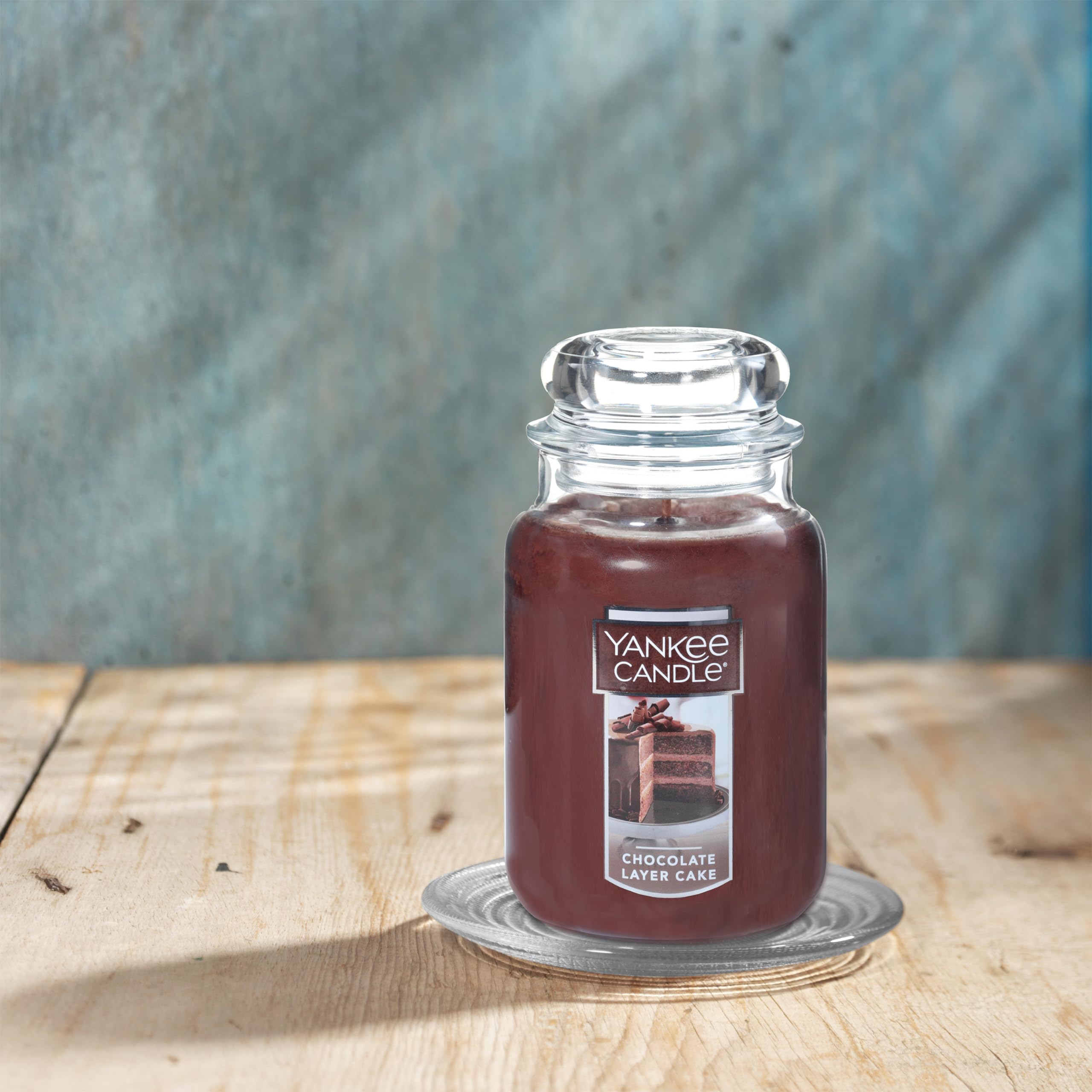 Yankee Candle mèche allumée illustrant flamme propre et combustion régulière