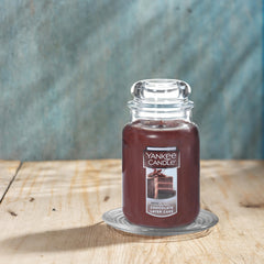 Yankee Candle mèche allumée illustrant flamme propre et combustion régulière