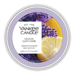Yankee Candle cup insérée dans un warmer illustrant diffusion rapide et sans flamme