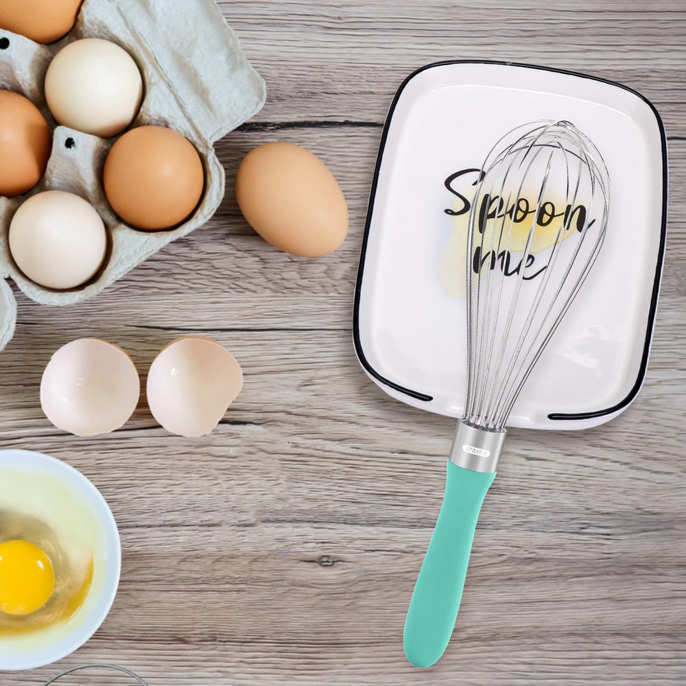 Repose-cuillère YENLNI en usage avec spatule et louche, garde le plan de travail propre