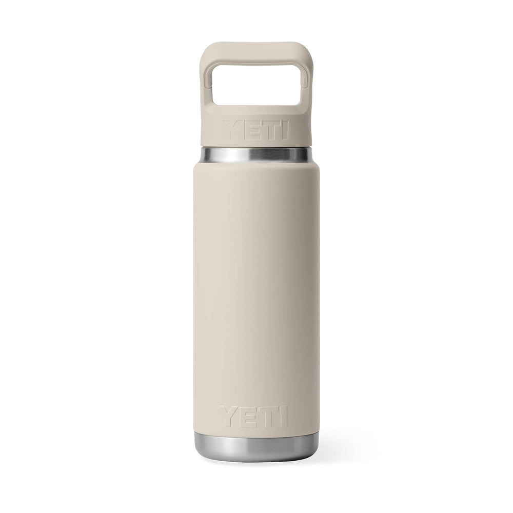 YETI Rambler en randonnée posée sur un rocher, résistance et fiabilité en plein air