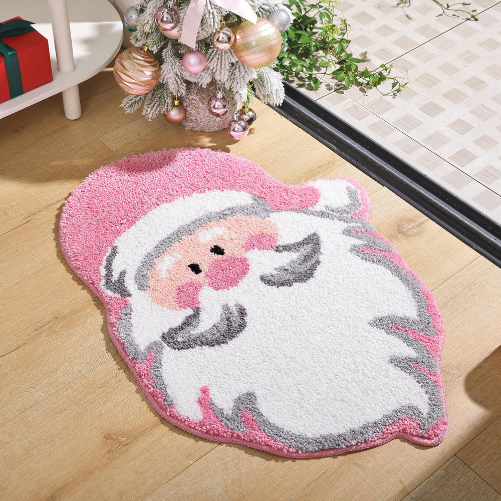YIKUSH vue de face du tapis Père Noël rose montrant motif festif et confort