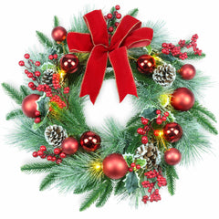 Couronne YULETIME sur porte montrant accueil festif