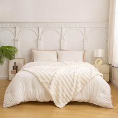 YUSOKI plaid posé sur lit illustrant ambiance cosy chambre