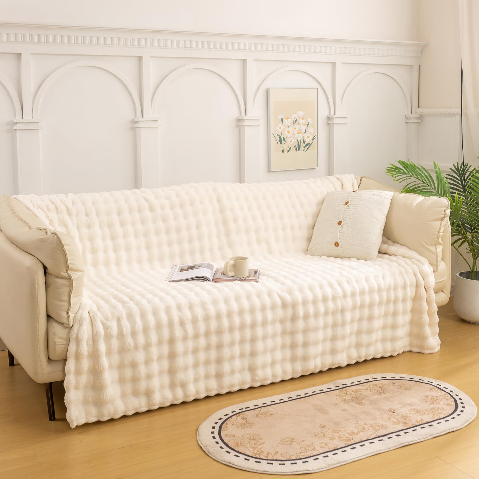 YUSOKI plaid sur canapé ajoutant chaleur décorative et style