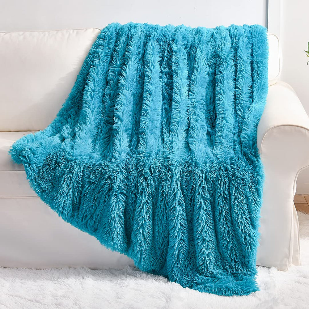 YUSOKI plaid face avant teal montrant luxe et confort