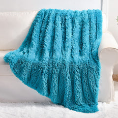 YUSOKI plaid face avant teal montrant luxe et confort