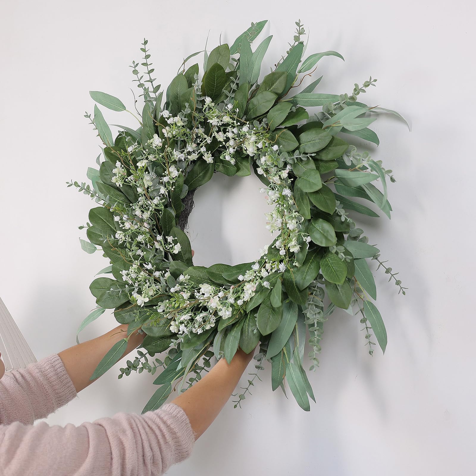 YXZZWL couronne pendue sur porte blanche effet chaleureux