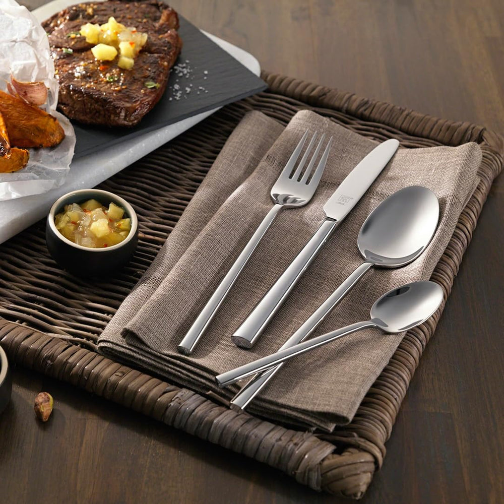 ZWILLING Opus comparaison taille main montrant le poids et la prise en main